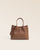 Our Renouard Saturn bag in fawn-colored vicuña leather, seen from the front in the studio.