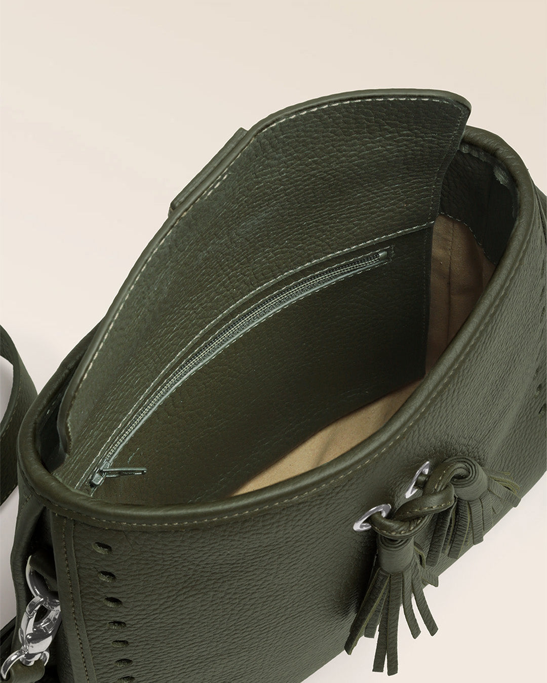 Our Tilbury Renouard bag in khaki vicuña-style leather, seen open in the studio.
