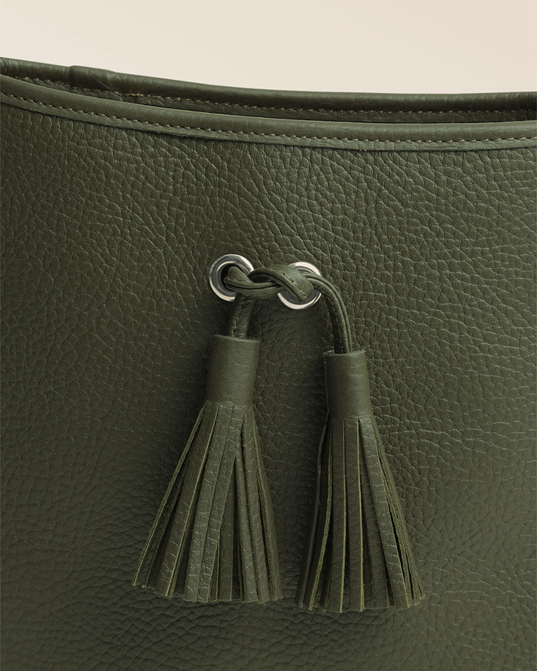 Our Tilbury Renouard bag in khaki vicuña-style leather, seen up close in the studio.