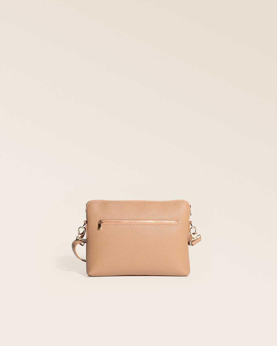 Our Touline bag in cappuccino vicuña-style leather, seen from the back in the studio.