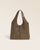 Le sac Valentine Renouard en cuir veau velours truffe, vu de face en ambiance.